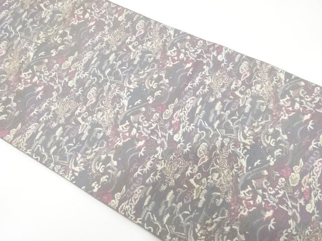 龍虎に草花模様織り出し　名古屋帯